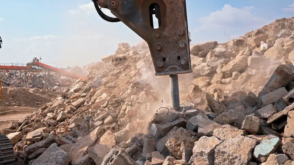 Conveyor dropping processed material